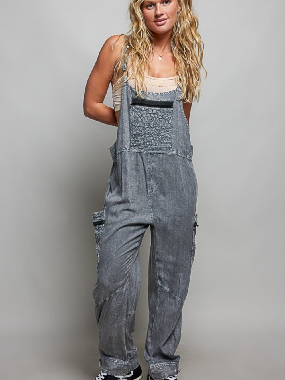 POL Woven overall jumpsuit featuring adjustable shoulder straps and a structured